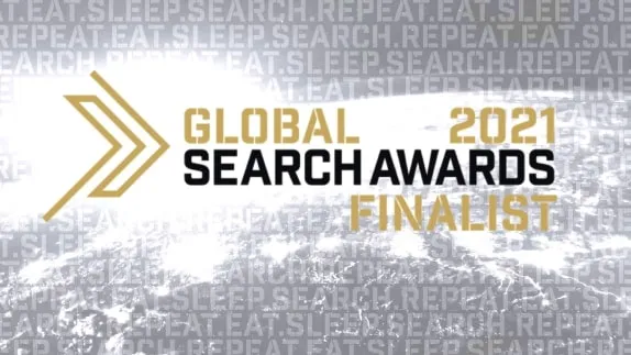 Global Search Awards 2021 Finalist graphic with bold text and a digital earth background, overlaid with repeated phrases "EAT. SLEEP. SEARCH. REPEAT."