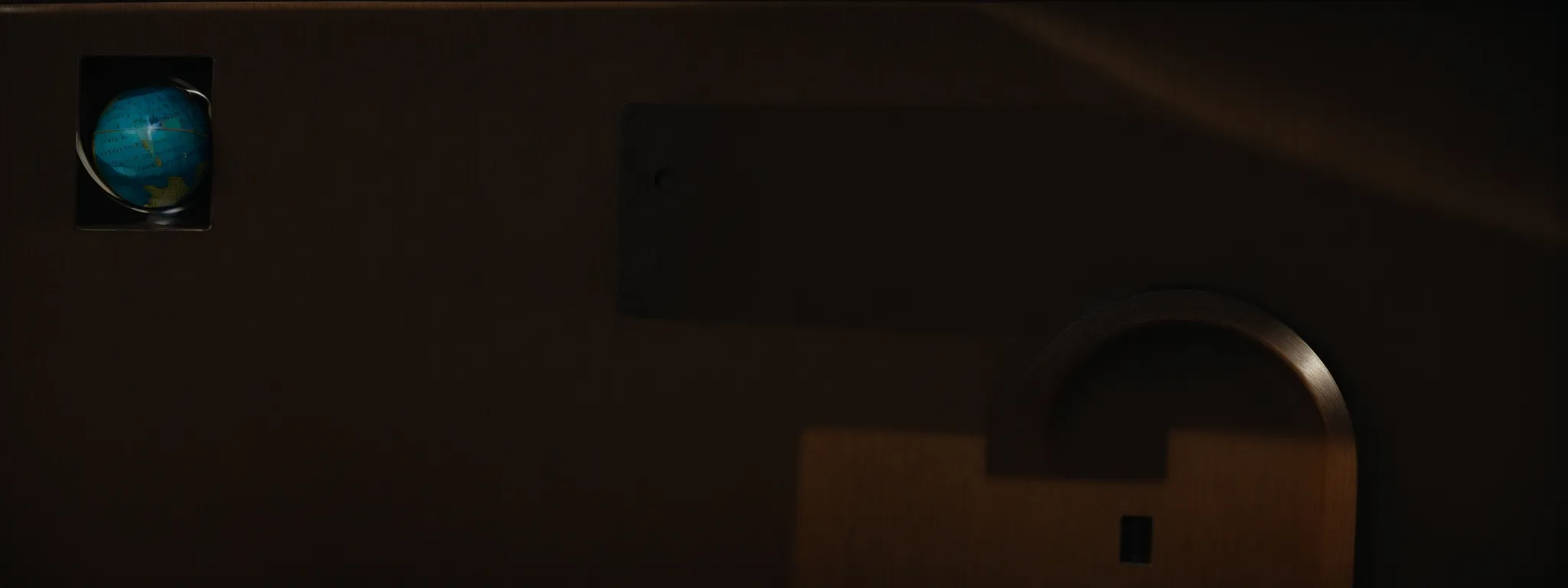 a secure lock encompassing a globe symbolizing internet protection.