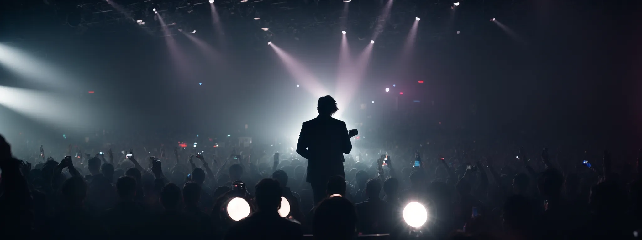 a concert crowd illuminated by the stage lights with a silhouette of a guitarist on stage amidst a backdrop of computers and search bar graphics.