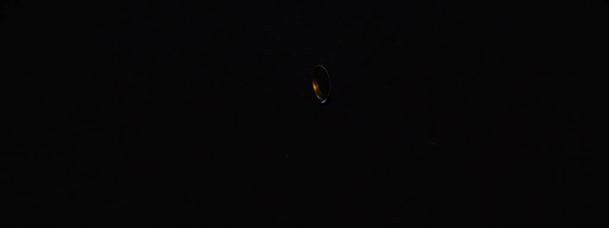 a magnifying glass hovering over a spider web in a dimly lit, dusty corner.