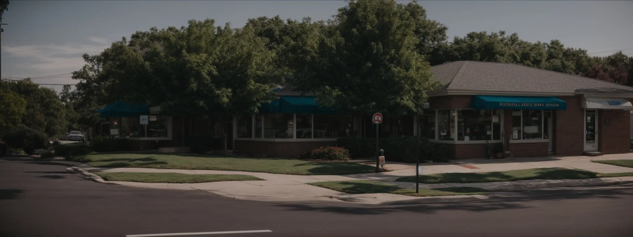 a personal injury attorney's office stands prominently on a suburban street corner, welcoming local residents seeking legal assistance.