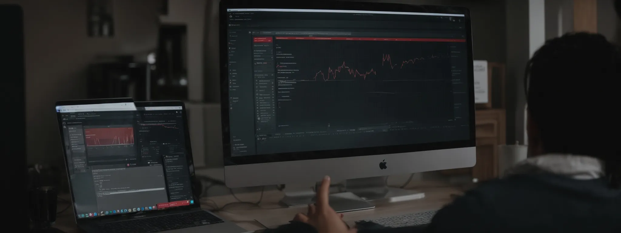 a person looking at youtube analytics on a computer screen, illustrating the optimization of a video's seo.