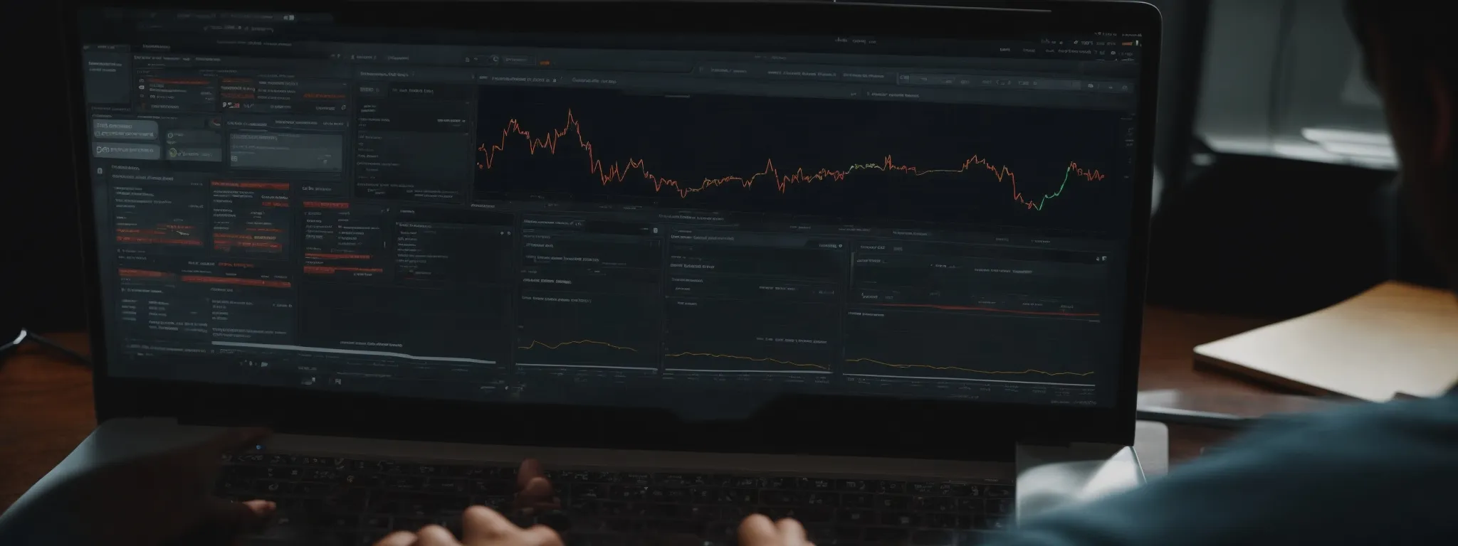 a person consulting a laptop screen with a complex seo analytics dashboard reflecting various keyword performance metrics.