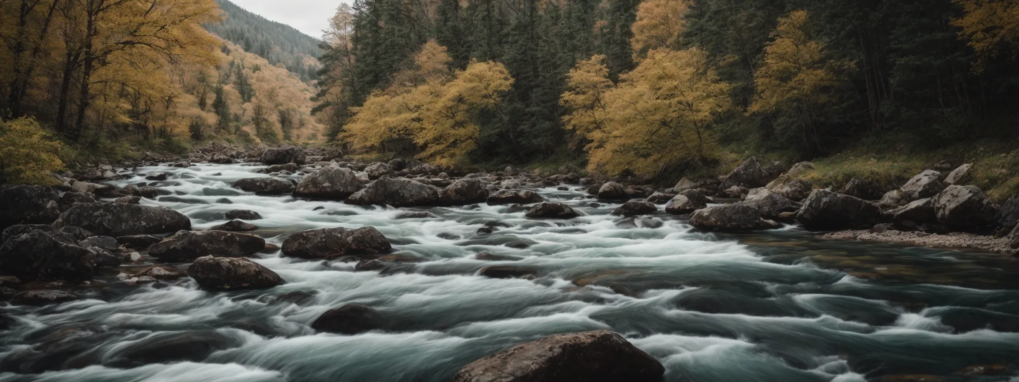 a clear, wide river flowing smoothly through a serene landscape, symbolizing ease of navigation.