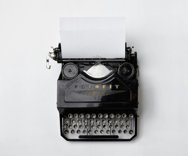 a typewriter that represents the role of content for SEO pillars