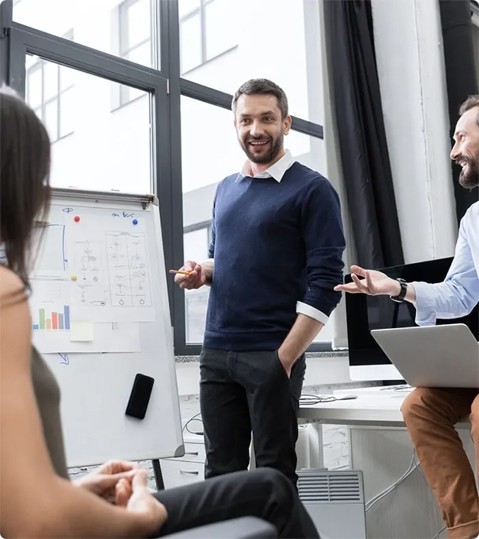 https://stg.linkgraph.com/wp-content/uploads/2025/05/team-leader-whiteboard-business-strategy-1.webp